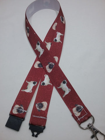 Pug dogs puppies patterned rusty red coloured ribbon Lanyard it has a safety breakaway fastener with swivel lobster clasp lanyard id or whistle holder