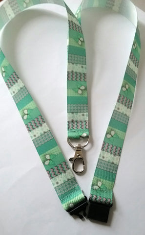 Butteflies on green ribbon landyard with safety breakaway lanyard id or whistle holder neck strap