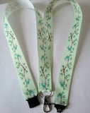 Cute love birds on a green ribbon landyard with safety breakaway lanyard id or whistle holder neck strap - Tilly Bees