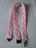 Lanyard made with a pink little piggy ribbon lanyard made with a safety breakaway id or whistle holder with swivel lobster clasp - Tilly Bees