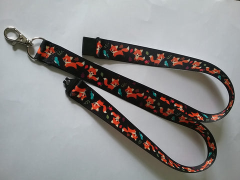 Fox & birds on black ribbon lanyard made with a safety breakaway id or whistle holder with swivel lobster clasp