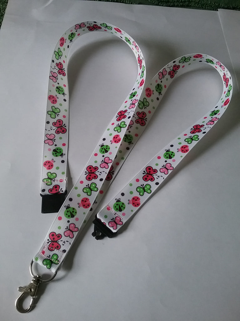 LANYARD white grosgrain ribbon with butterflies & ladybirds as the pattern with safety breakaway clip & silver colored swivel clasp id or whistle butterfly holder - Tilly Bees