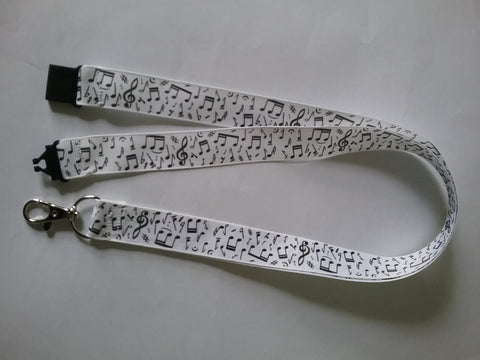 LANYARD black musical notes on white ribbon safety breakaway clip & silver colored swivel clasp id or whistle butterfly holder