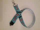 Turquoise blue cartoon dachshund patterned ribbon lanyard made with a safety breakaway id or whistle holder with swivel lobster clasp - Tilly Bees