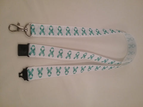 Cervical cancer jade ribbons on a white ribbon lanyard made with a safety quick release breakaway id or whistle holder with swivel lobster clasp
