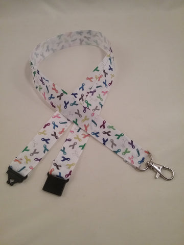 Cancer support Multi coloured ribbons on white ribbon lanyard made with a safety quick release breakaway id or whistle holder with swivel lobster clasp