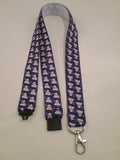 Cute puppy dog on blue ribbon lanyard made with a safety quick release breakaway id or whistle holder with swivel lobster clasp - Tilly Bees