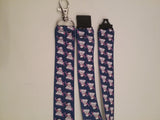 Cute puppy dog on blue ribbon lanyard made with a safety quick release breakaway id or whistle holder with swivel lobster clasp - Tilly Bees