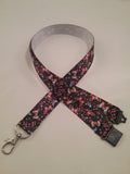 Coloured butterfly patterned ribbon lanyard made with a safety quick release breakaway id or whistle holder with swivel lobster clasp - Tilly Bees
