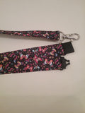 Coloured butterfly patterned ribbon lanyard made with a safety quick release breakaway id or whistle holder with swivel lobster clasp - Tilly Bees