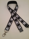 White Skull & crossbones on a black ribbon lanyard made with a safety quick release breakaway id or whistle holder with swivel lobster clasp - Tilly Bees