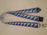 Unicorn on dark blue ribbon lanyard made with a safety quick release breakaway id or whistle holder with swivel lobster clasp - Tilly Bees