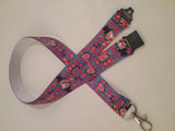 Clown patterned ribbon lanyard made with a safety quick release breakaway id or whistle holder with swivel lobster clasp - Tilly Bees