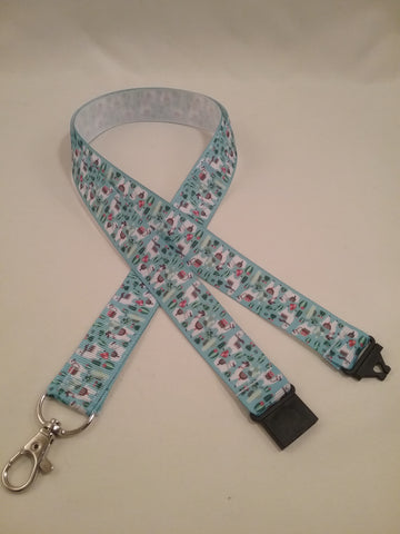 Llama Alpaca patterned blue ribbon Lanyard it has a safety breakaway fastener with swivel lobster clasp lanyard id or whistle holder